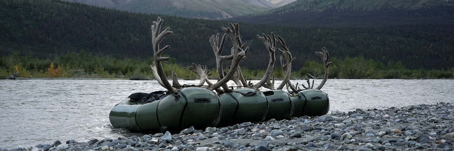 Four Caribou Bulls on Packrafts